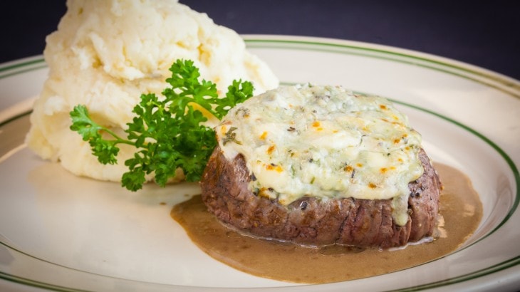 Steak with herb butter and mashed potatoes